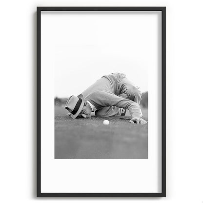 Eye to the ground on the 18th hole; golfing man eyes ball to measure distance to hole vintage black and white portrait photograph - photography - photographs poster Framed Art Print Gallery Image 85