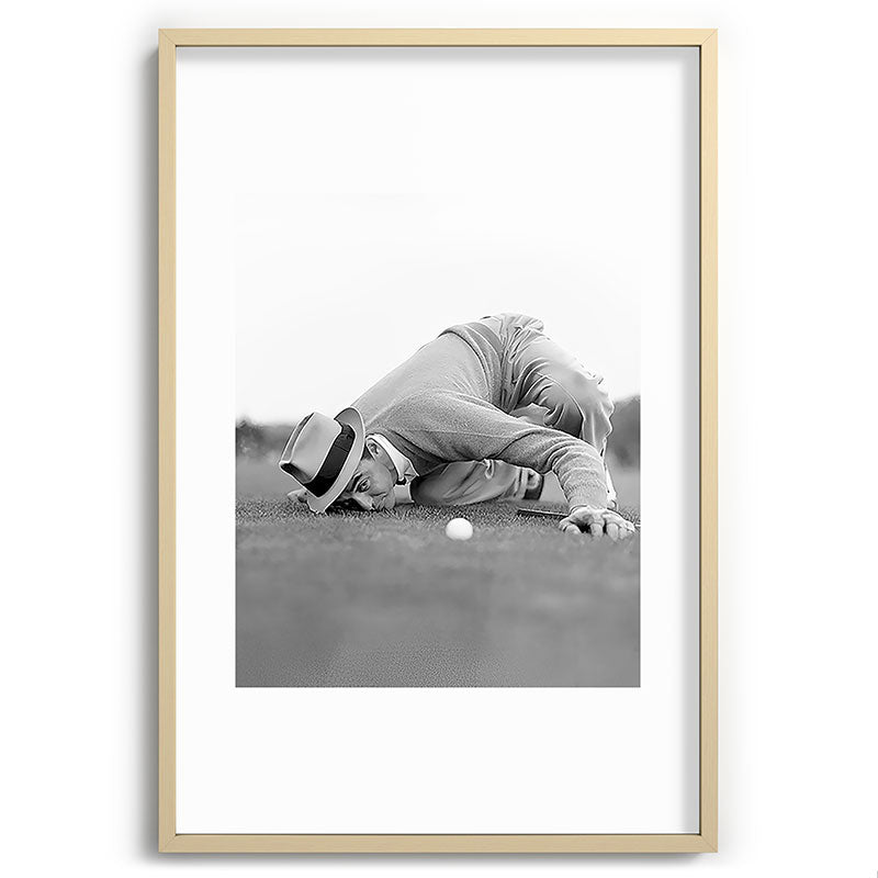 Eye to the ground on the 18th hole; golfing man eyes ball to measure distance to hole vintage black and white portrait photograph - photography - photographs poster Framed Art Print Gallery Image 102
