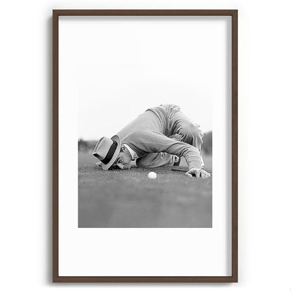 Eye to the ground on the 18th hole; golfing man eyes ball to measure distance to hole vintage black and white portrait photograph - photography - photographs poster Framed Art Print Gallery Image 94