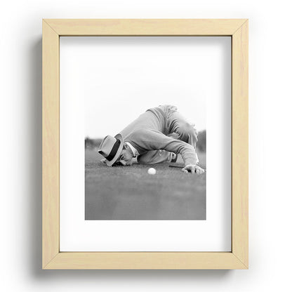 Eye to the ground on the 18th hole; golfing man eyes ball to measure distance to hole vintage black and white portrait photograph - photography - photographs poster Framed Art Print Gallery Image 96