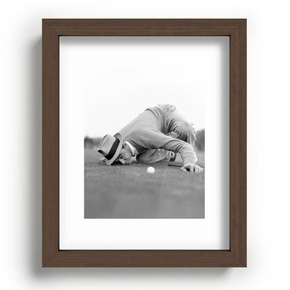 Eye to the ground on the 18th hole; golfing man eyes ball to measure distance to hole vintage black and white portrait photograph - photography - photographs poster Framed Art Print Gallery Image 88