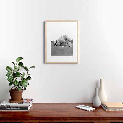 Eye to the ground on the 18th hole; golfing man eyes ball to measure distance to hole vintage black and white portrait photograph - photography - photographs poster Framed Art Print Gallery Image 26