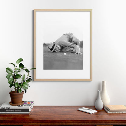 Eye to the ground on the 18th hole; golfing man eyes ball to measure distance to hole vintage black and white portrait photograph - photography - photographs poster Framed Art Print Gallery Image 67