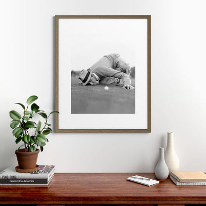 Eye to the ground on the 18th hole; golfing man eyes ball to measure distance to hole vintage black and white portrait photograph - photography - photographs poster Framed Art Print Gallery Image 58