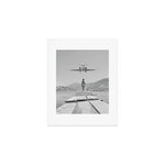 Steady As She Goes; aircraft coming in for an island landing black and white photography- photographs Art Print Gallery Image 1